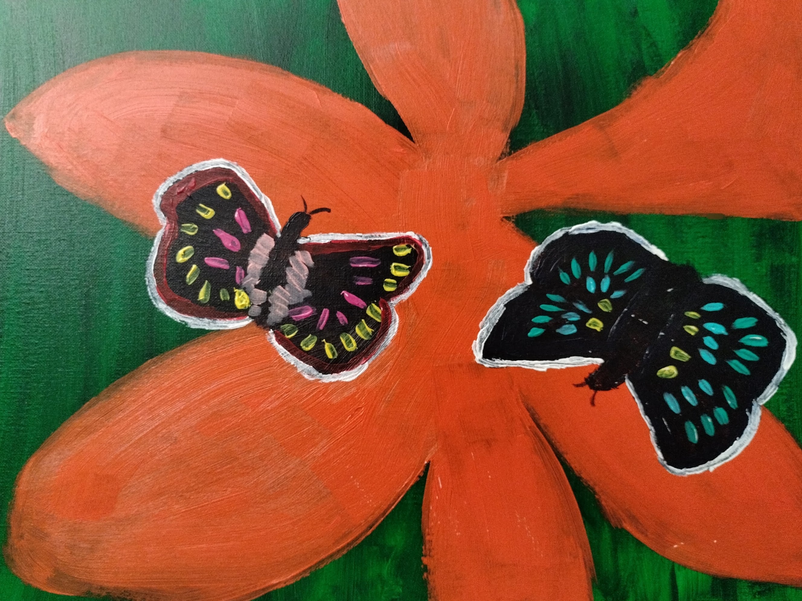 BUTTERFLIES ON AN ORANGE LILY